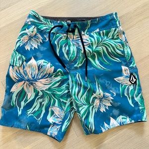 Boys Volcom Boardshorts. Size 26. Blue floral print.